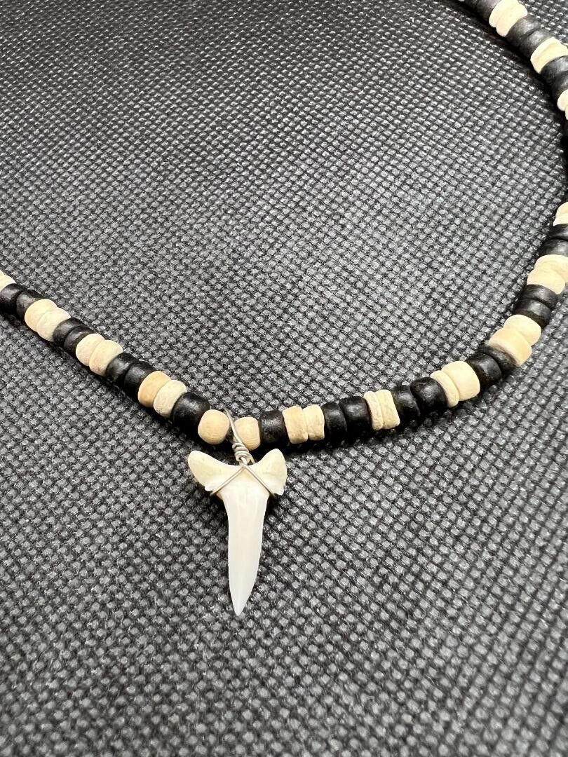 Real Mako Shark Medium Tooth on a Brown and off-white Beaded Necklace