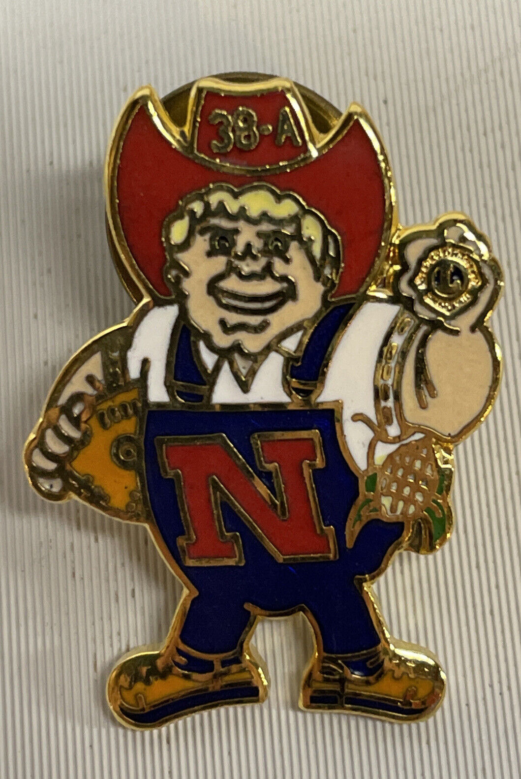 Nebraska Cornhuskers Lions Club Lapel Pin Vintage Football Herbie Husker 1989