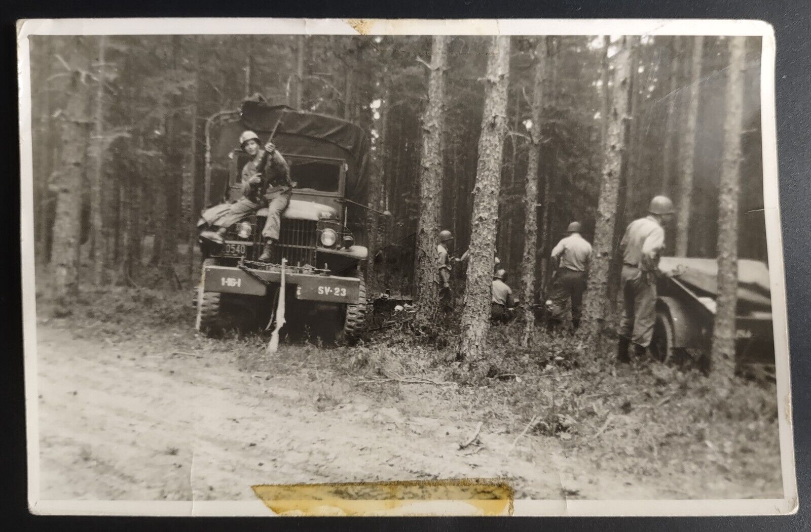 RPPC Military Soldier On Truck Holding Rifle In Wooded Area With Other Soldiers