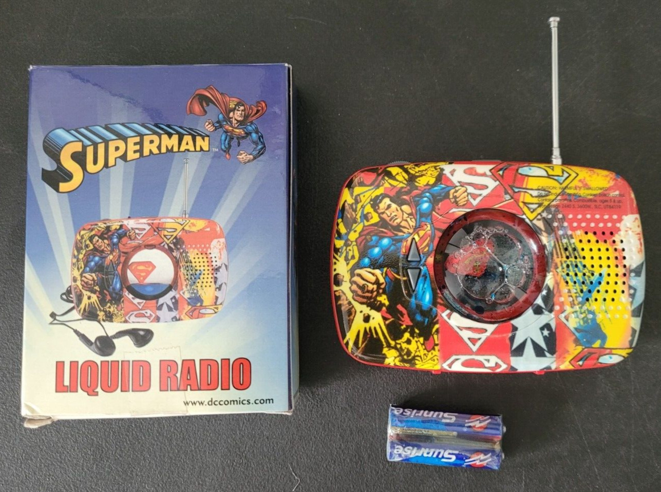 SUPERMAN LIQUID RADIO WITH EARBUS WB NEW IN BOX