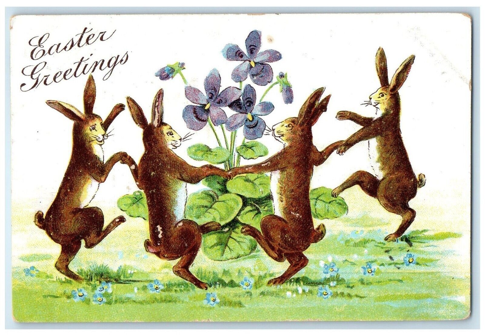 1907 Easter Greetings Anthropomorphic Rabbit Playing Flowers Embossed Postcard