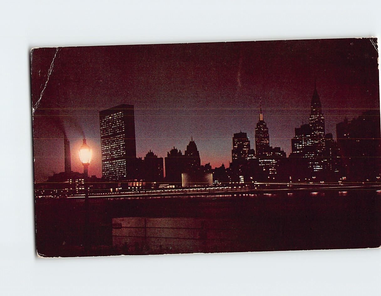 Postcard Night Falls over the United Nations NYC New York USA North America
