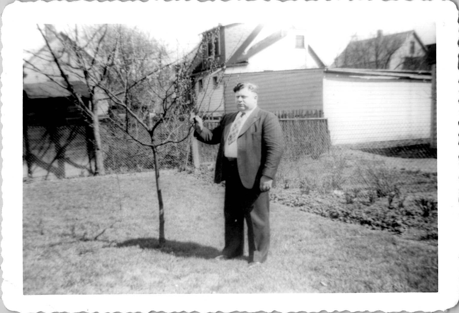 Fat Obese Man Wearing Tight Suit Posing with Tree Snapshot 1940s Vintage Photo