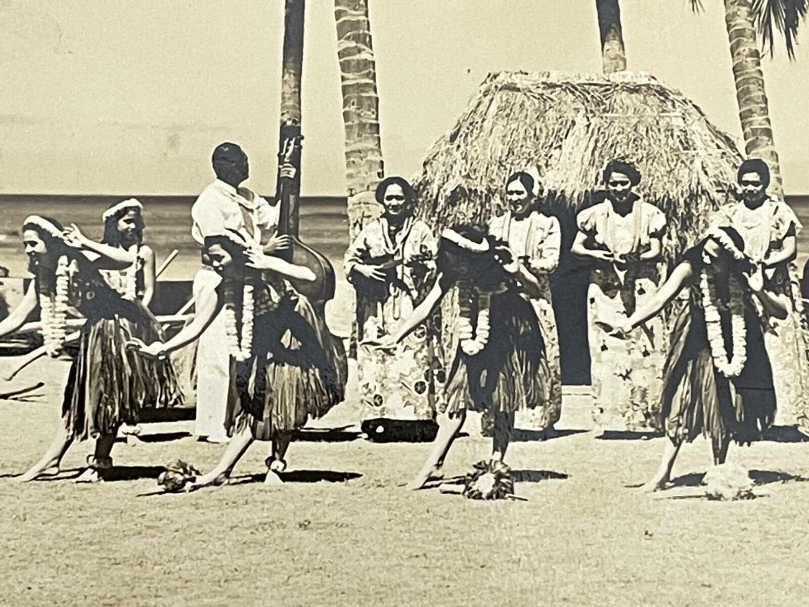 H7 RPPC Photo Postcard Hula  Hawaii Beach Dancing Ukuleles Band Grass Skirt