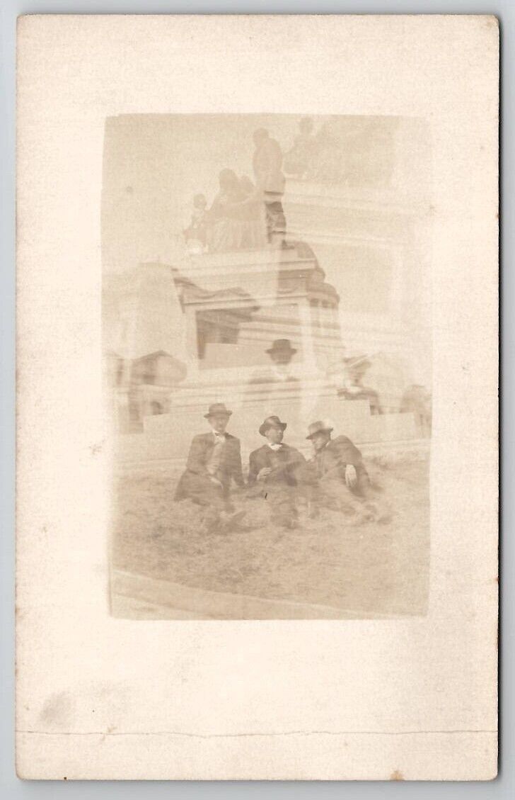 RPPC Double Exposure Handsome Men Laying on Lawn Monument Postcard D26