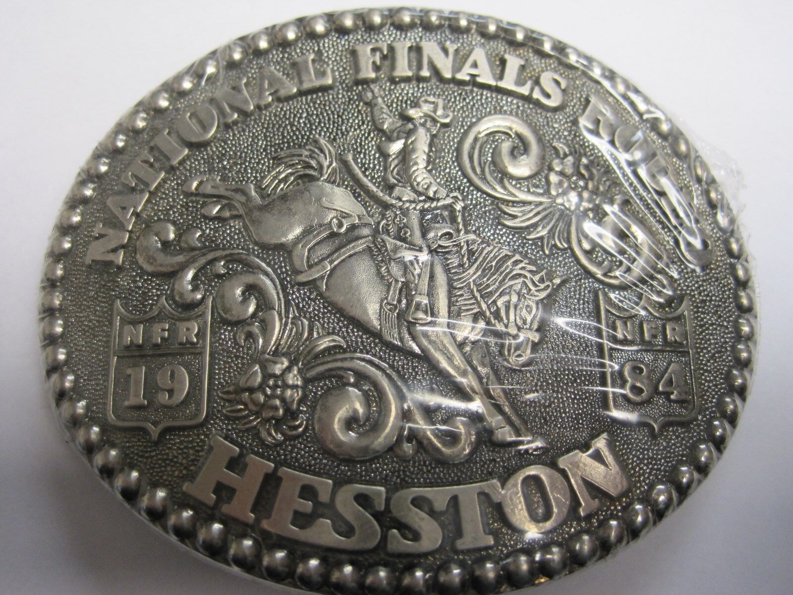 National Finals Rodeo Hesston 1984 NFR Adult Cowboy Buckle Vintage Orig. Pkg.   