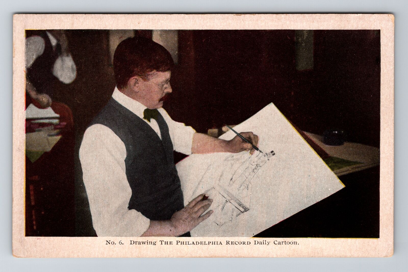 Drawing the cartoon for the Philadelphia Record, Pennsylvania Vintage Postcard