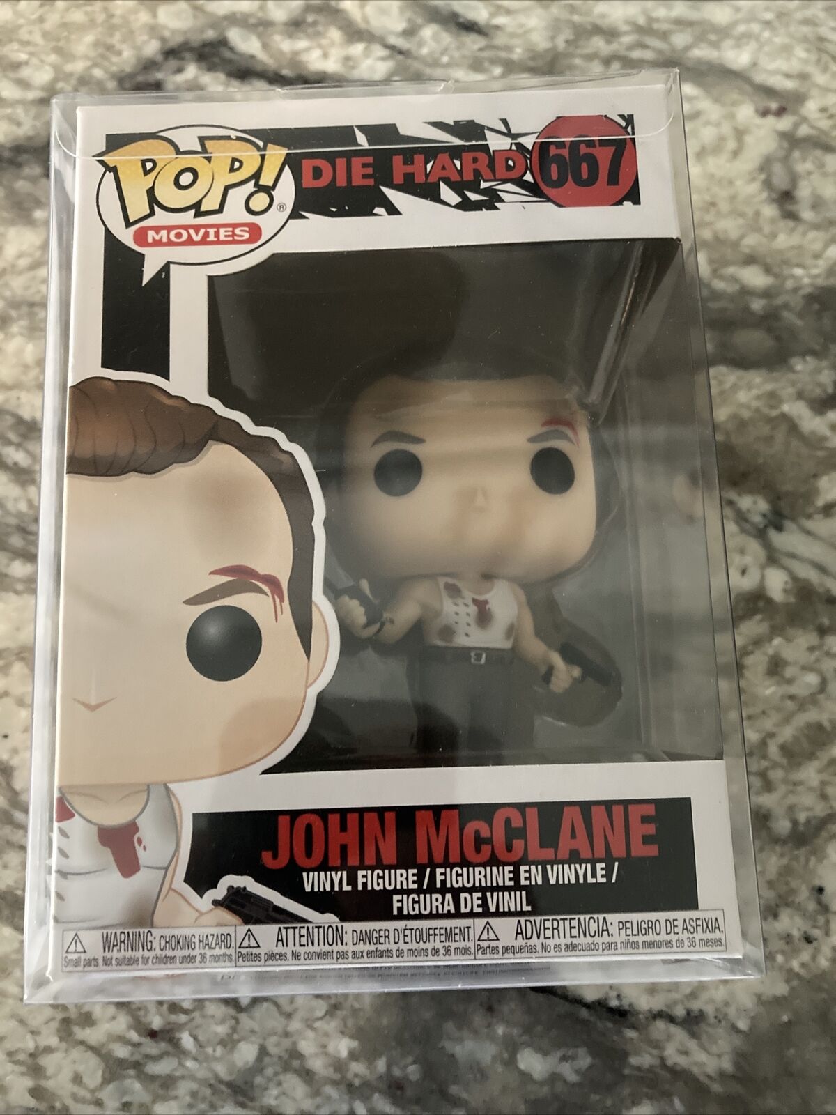 Funko Pop Vinyl: John McClane #667 With Vinyl Box Protector