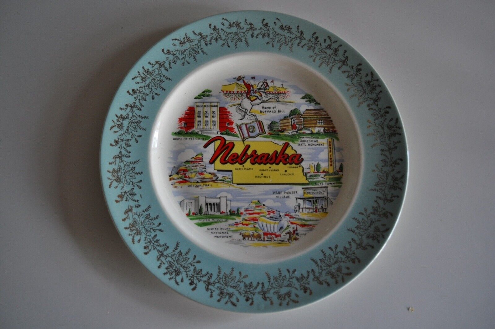 Vintage Nebraska State Plate 1950’s with Green and Gold Band