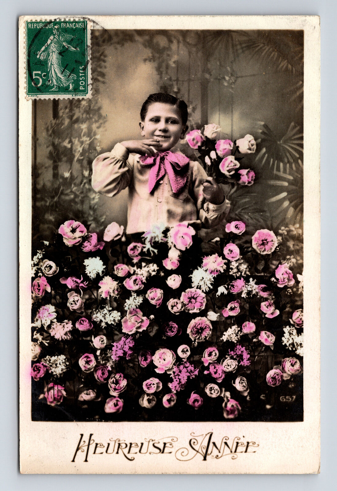 c1911 RPPC Young French Boy Pink Flowers Heureuse Anne Hand Colored Postcard