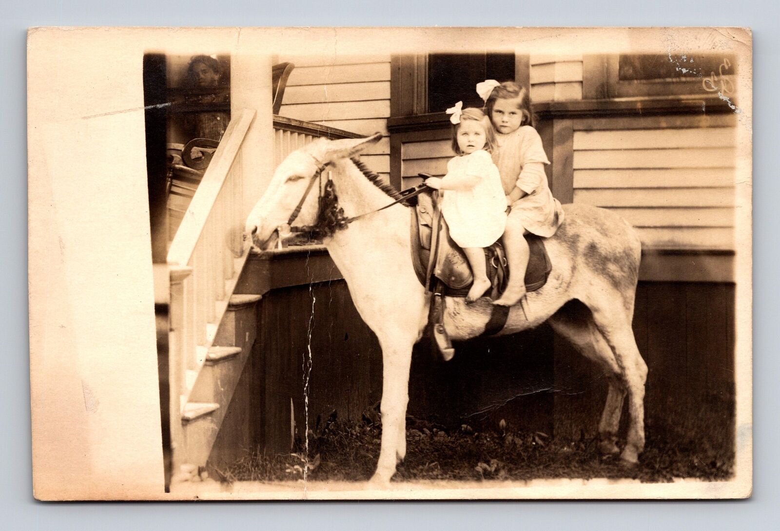 1904-1918 AZO RPPC Postcard Mysterious Girl in Window, Two Girls on Mule