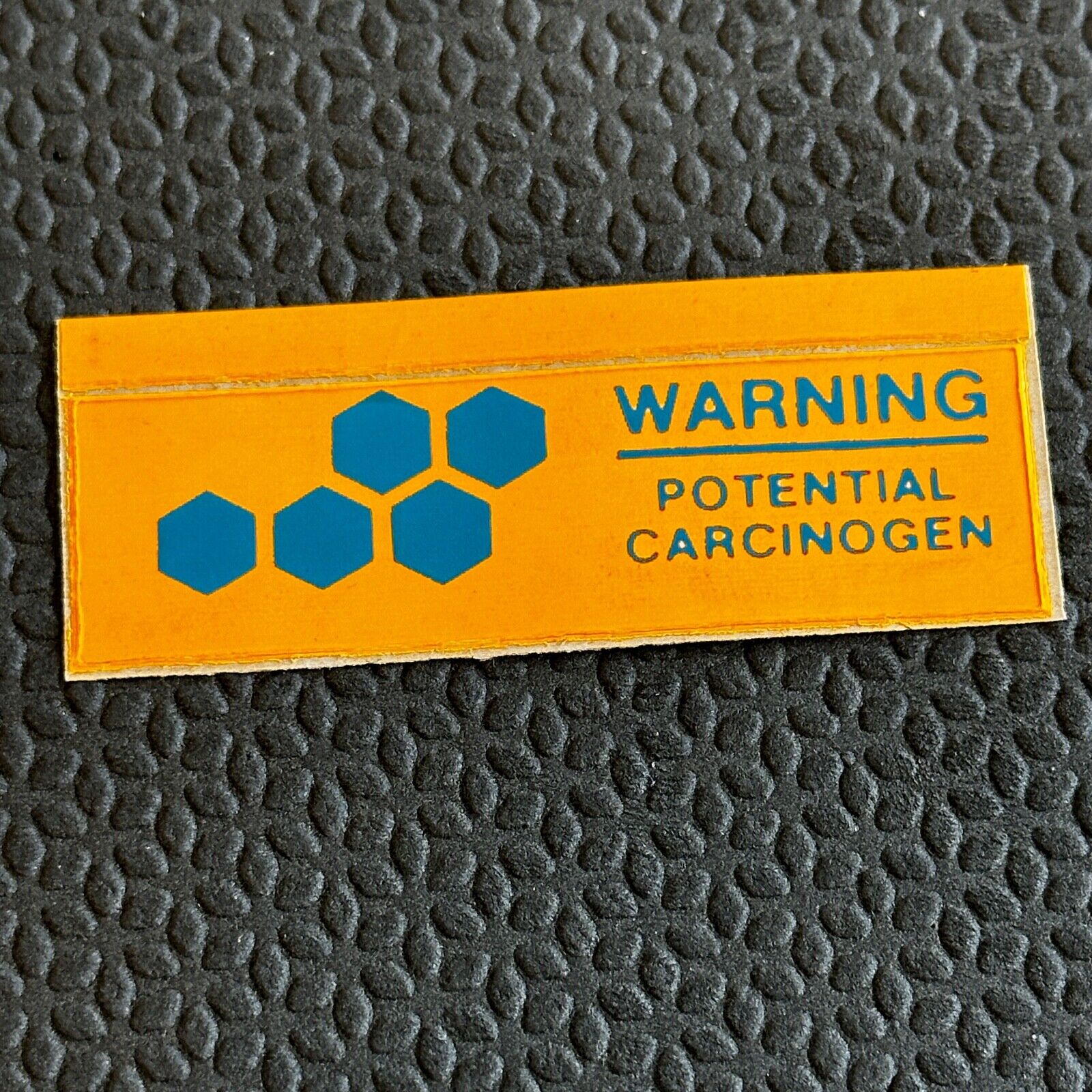 Vintage Sticker Warning Potential Carcinogen Orange Blue
