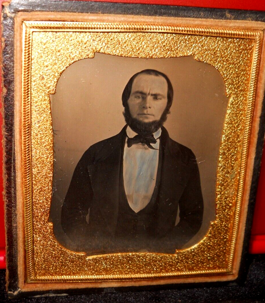 1840's 1/6th size Scovills Daguerreotype of man in half case