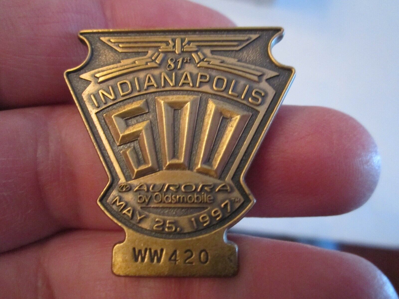 1997 81TH INDIANAPOLIS 500 AURORA BY OLDSMOBILE METAL BADGE PIN - BBA-15