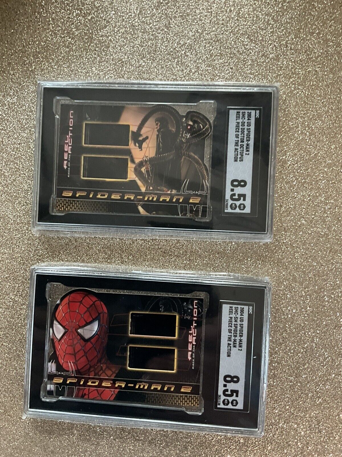 2004 UD Spider-Man 2 ‘’ REEL PIECE OF THE ACTION ‘’ …. AND … 2004 UD DR. OCTOPUS