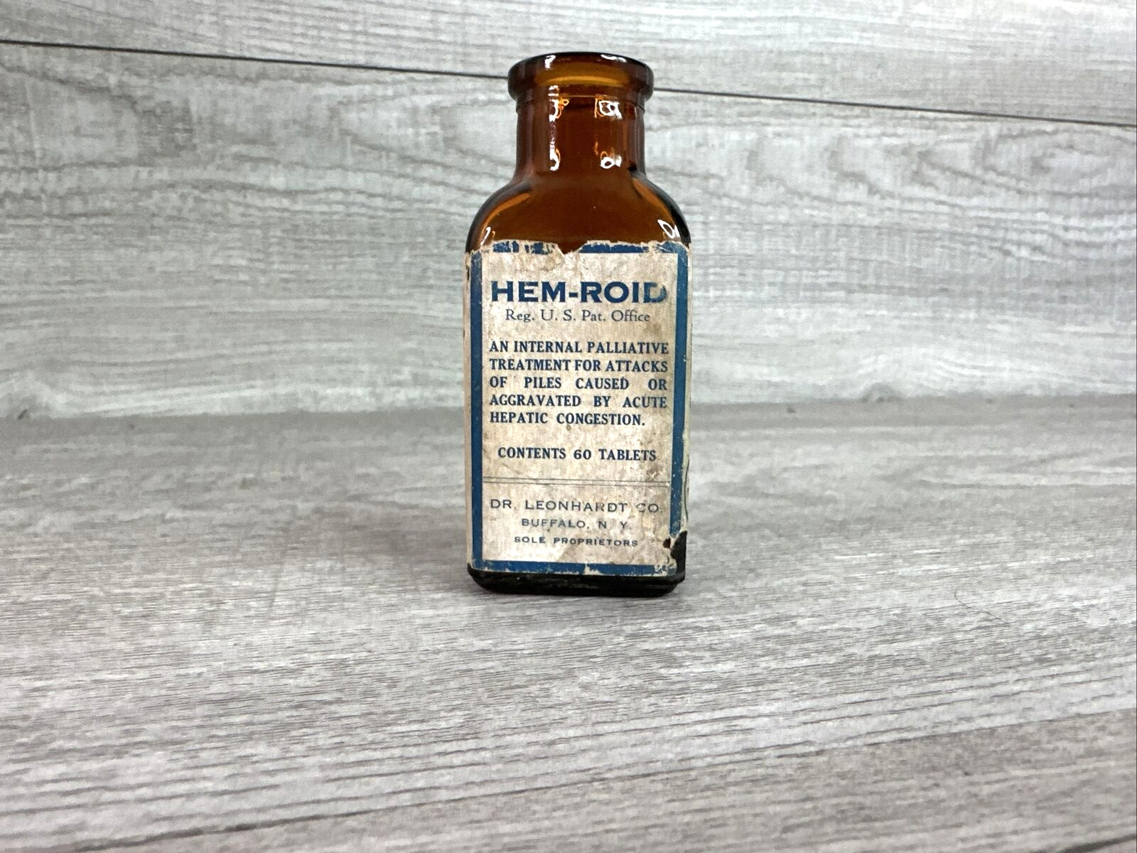 Vintage Dr. Leonhart  Hem-roid Medicine Bottle w/paper label Amber