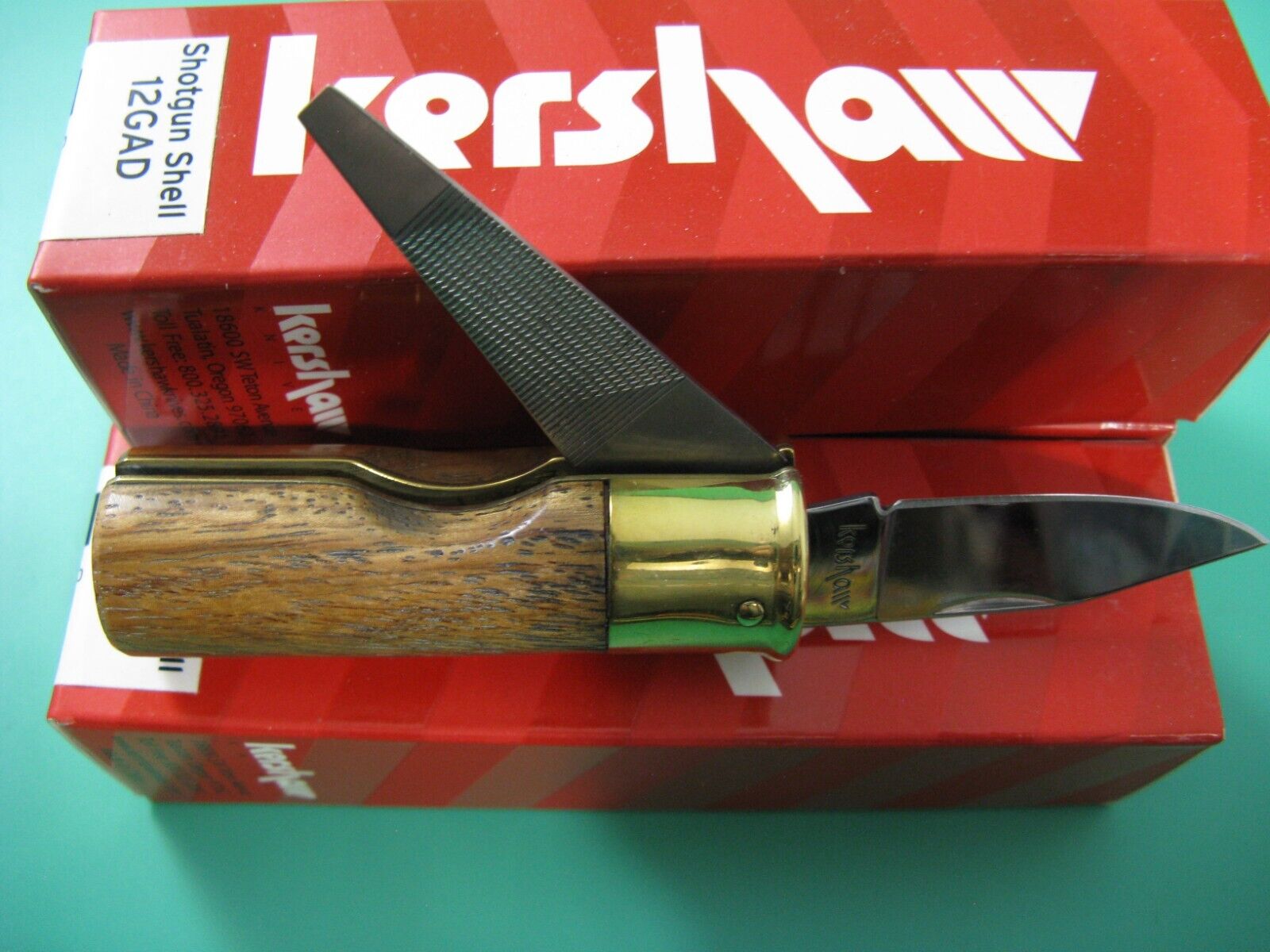 NEW in box 2012 KERSHAW SHOTGUN SHELL KNIFE 12GAD Discontinued