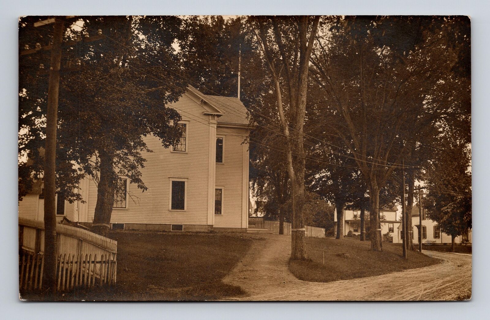 c1904-1920s RPPC Postcard Small Town Buildings School View Hollis Wade