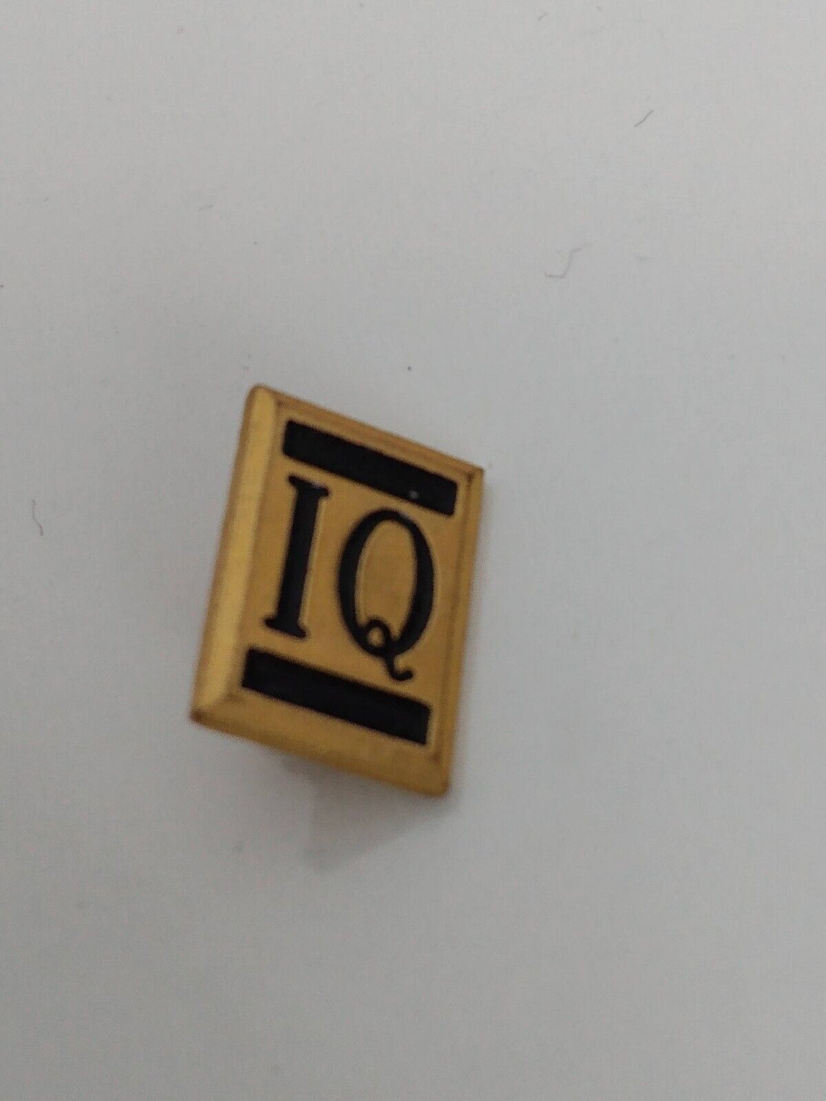 IQ Black Letters Small Gold Toned Hinged Pinback Lapel Pin