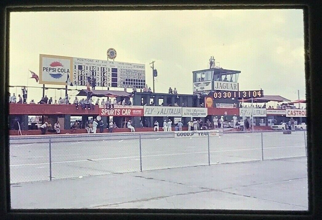 1960's Sebring FL 12 hour 1965 Race fan area with positions board being changed