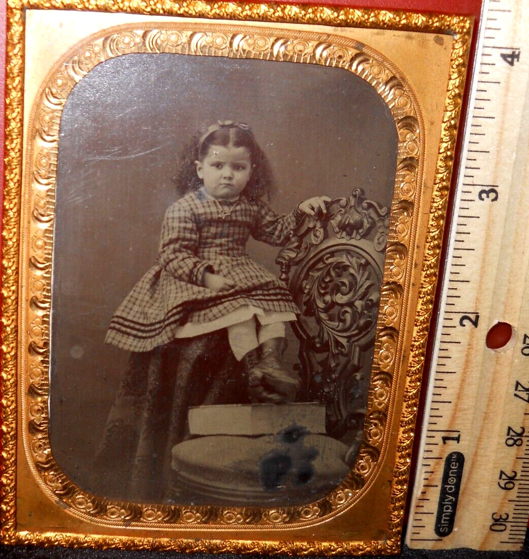 Quarter plate size Tintype of young girl in brass mat/frame