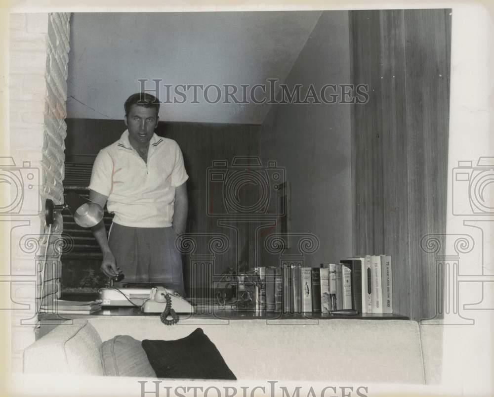 1956 Press Photo Actor Fess Parker listening to record at his home - kfa07023