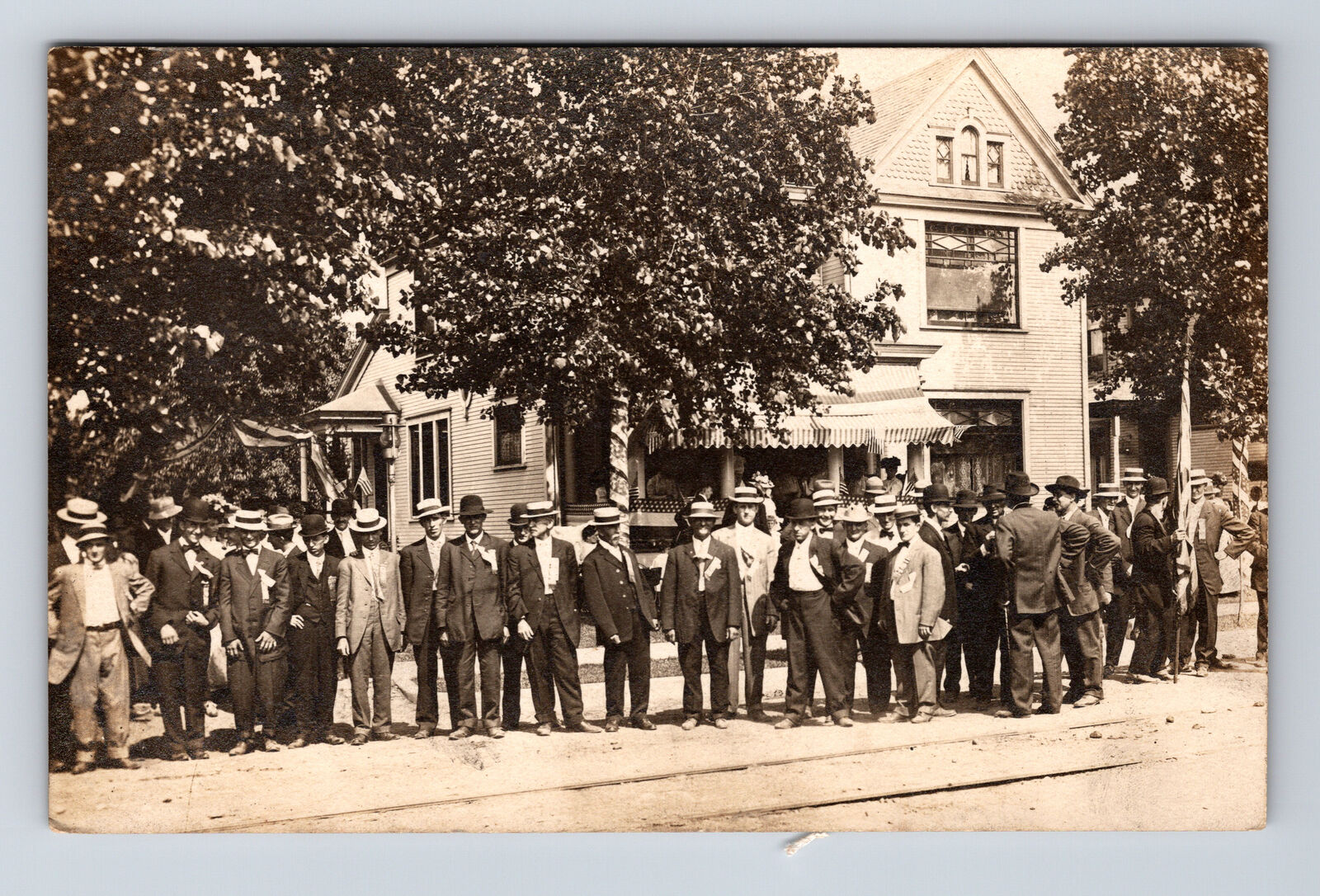 RPPC Large Group of Men in Suits Hats Gather Along Street Real Photo Postcard