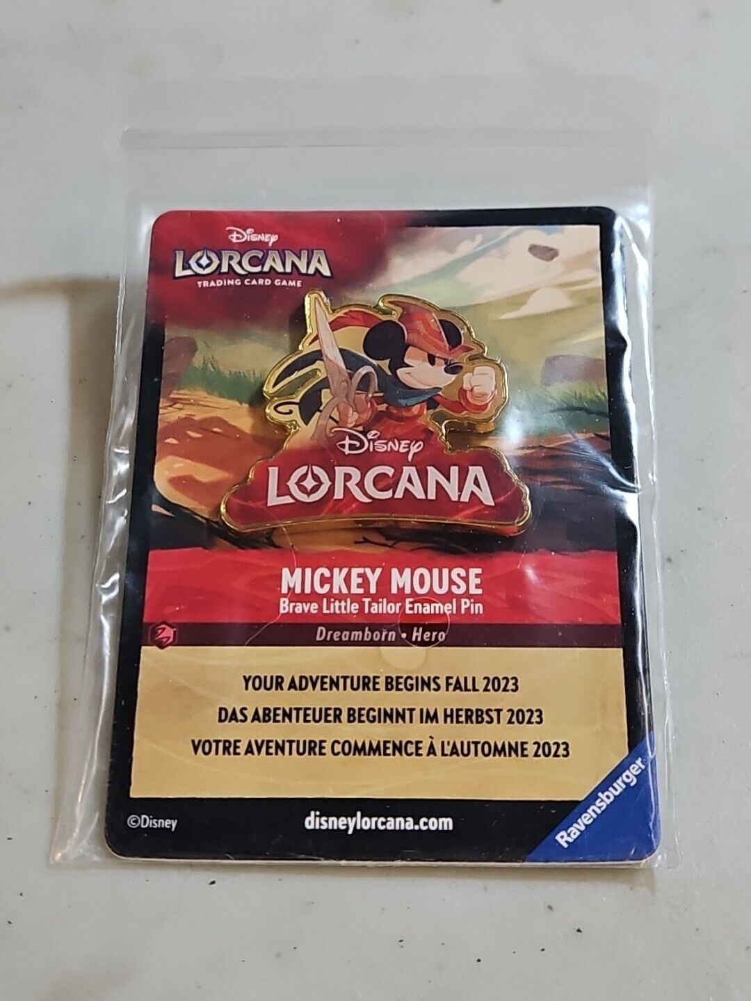 Lorcana Disney Mickey Brave Little Tailor Pin GenCon D23 exclusive On Card
