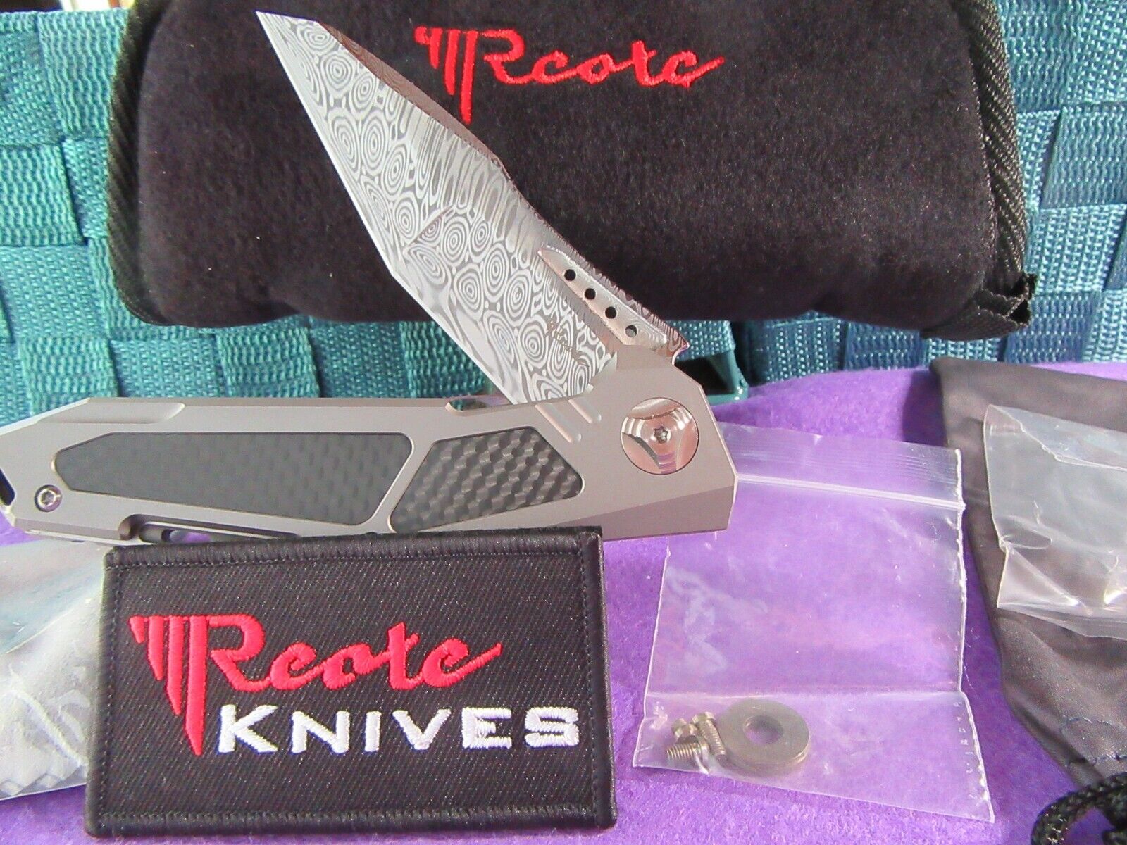 Reate K-3  Carbon Fiber / Damascus.  Mint in Box with the Original Packaging.