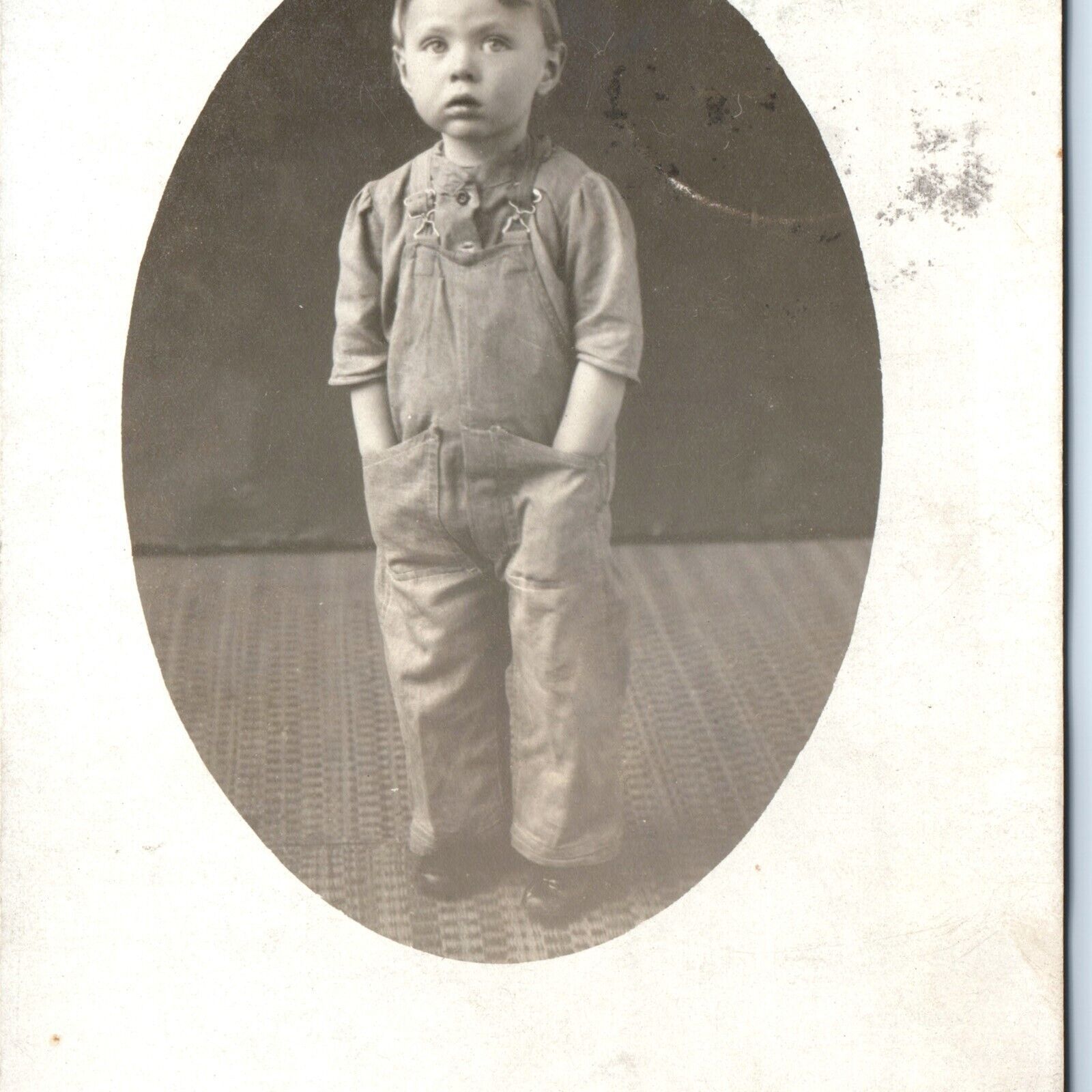 c1910s Handsome Mature Little Boy Overalls Hat RPPC Kid Writes? Real Photo A142