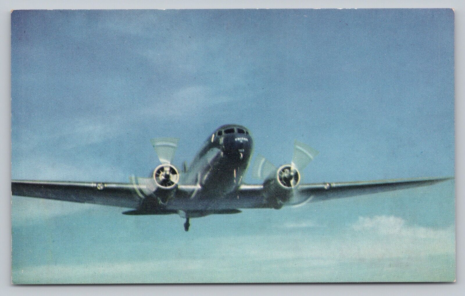 Postcard United Airlines Issued Airplane Mainliner Airway Cruising Flight J4