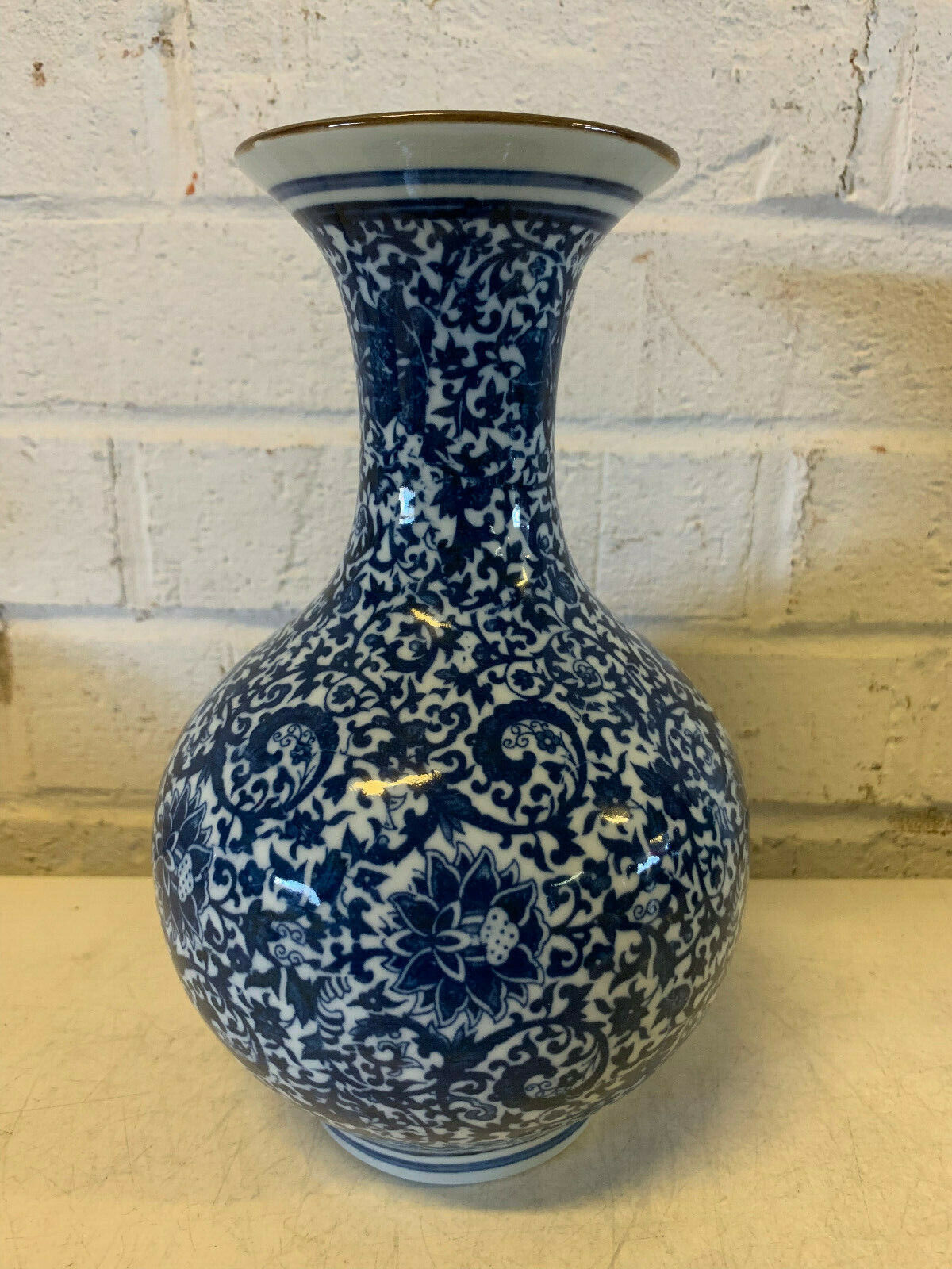 Chinese Blue & White Floral Decorated Bottle Form Porcelain Vase w Qianlong Mark