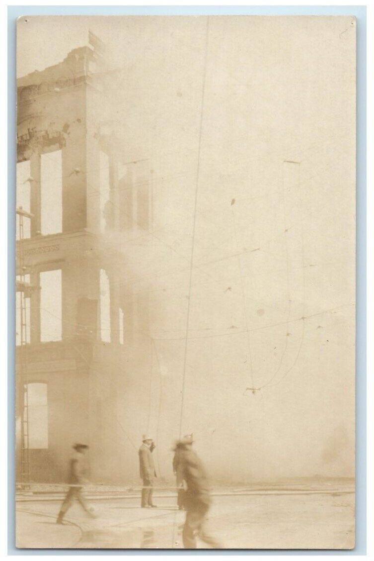 1909 Disaster Fire Firemen Smoke Building Manistee MI RPPC Photo Postcard