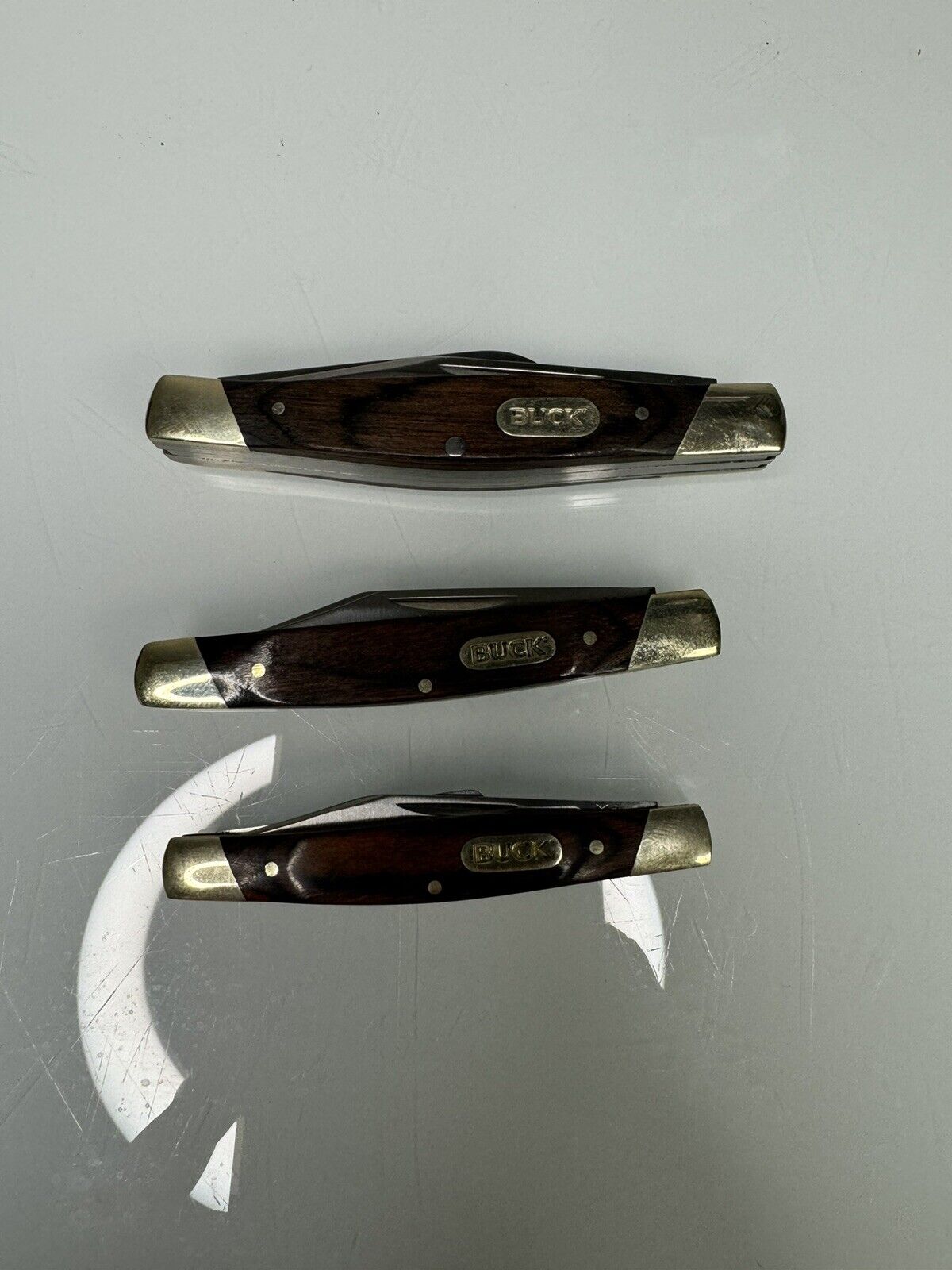 Lot Of 3 Buck Folding Pocket Knives Knife Woodgrain Handle 373 375 379