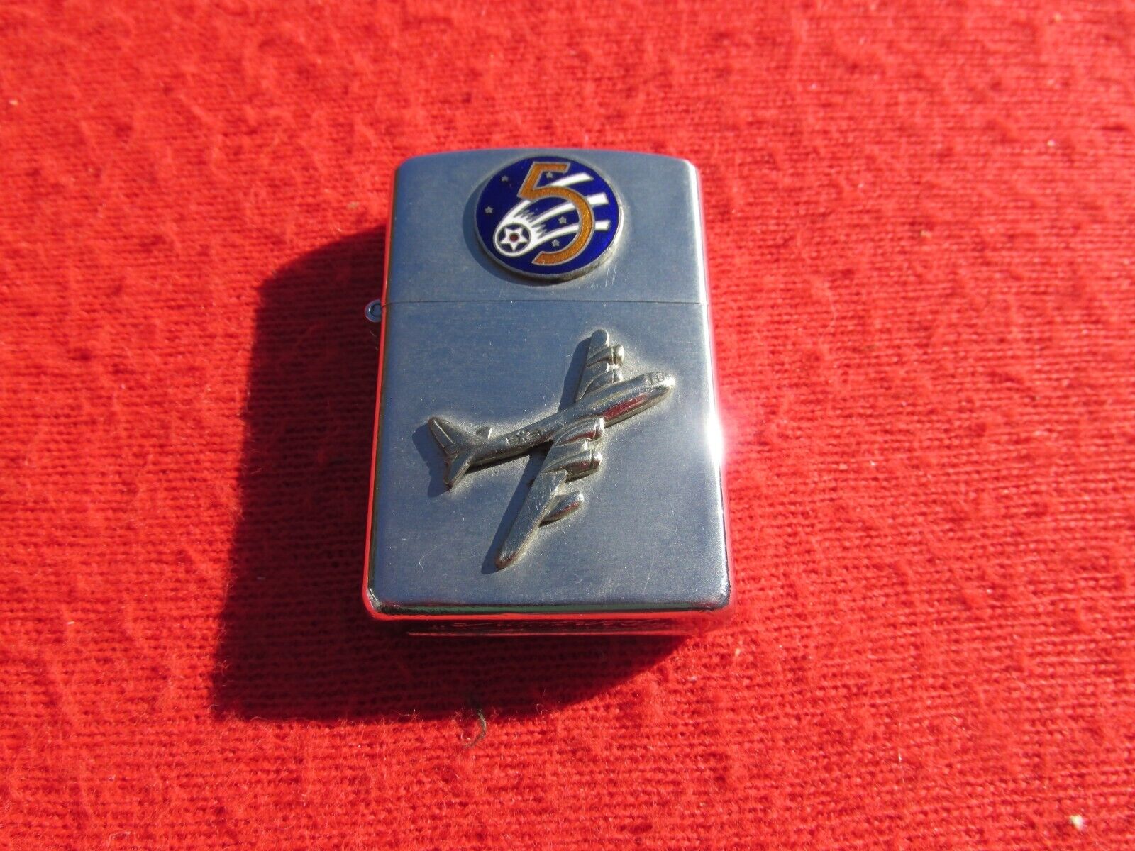 Vintage Penguin Lighter  5th Air Force  B-29 aircraft 5th patch