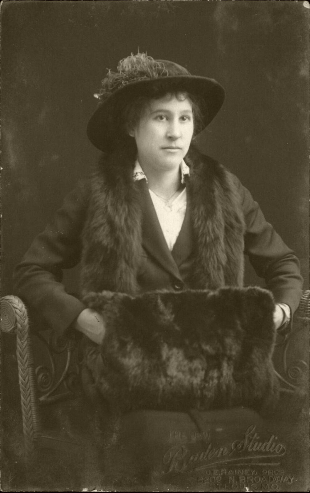Women ~ hat and fur muff ~ portrait by JE Rainey St Louis Missouri RPPC 1904-18