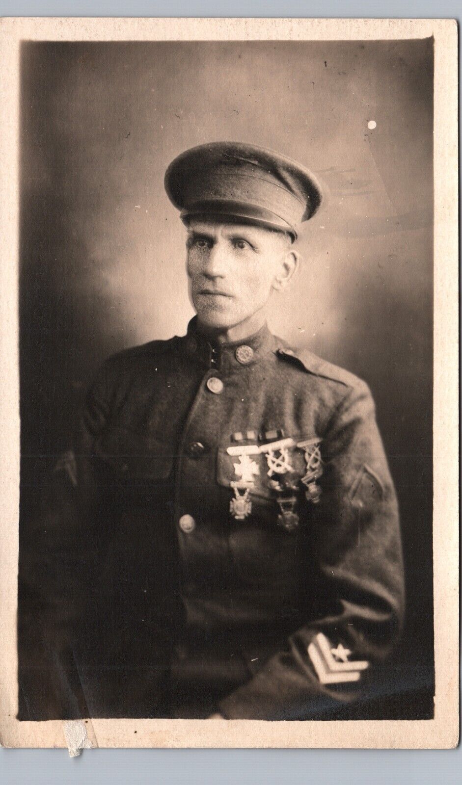 DECORATED WAR SOLDIER WW1 named studio portrait real photo postcard rppc