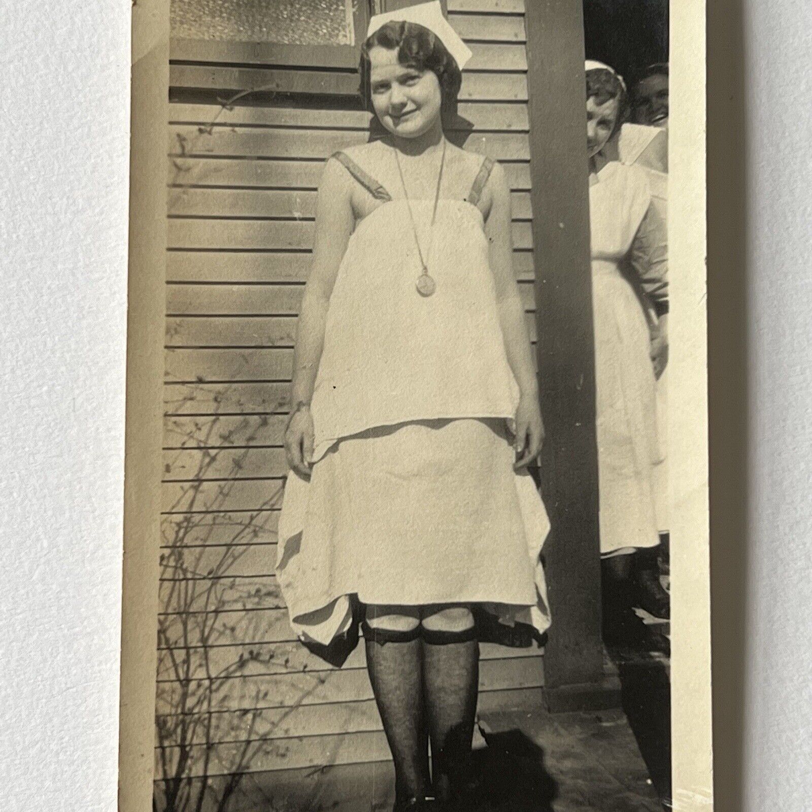 Antique Snapshot Photograph Beautiful Young Woman Nurse A Bit Naughty Stocking