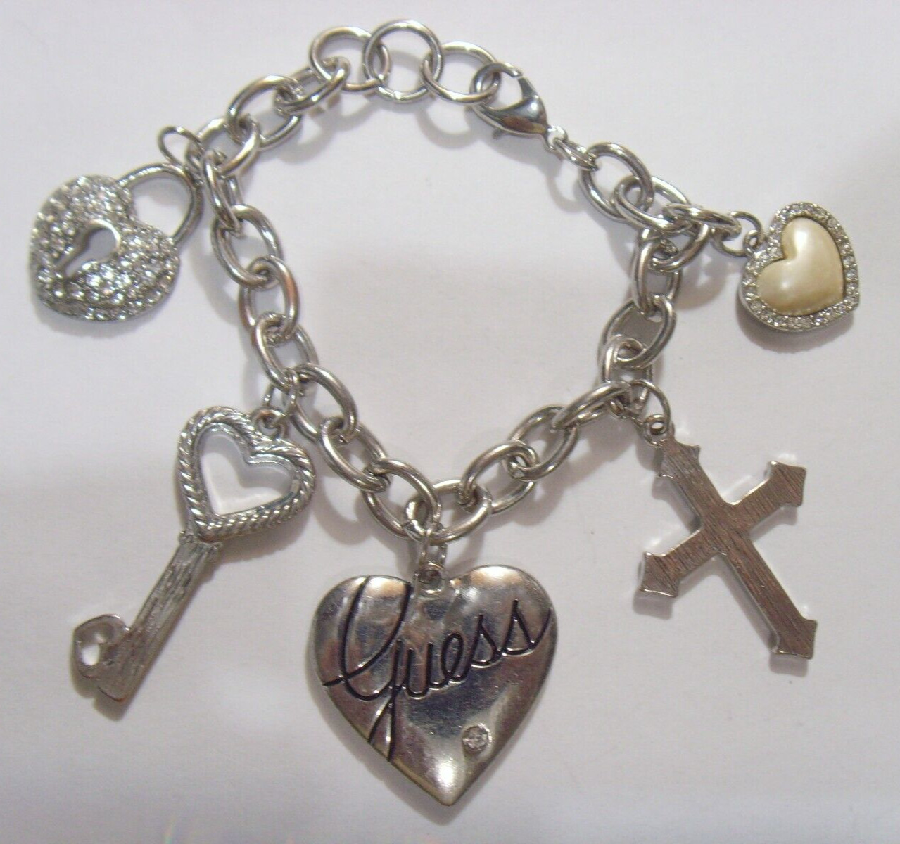 vintage Guess brand Christian Love Cross silver tone metal bracelet 52607