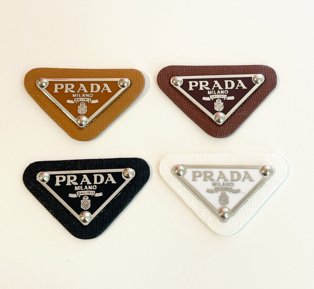 Prada Triangle Silver Leather Pendant  | Bundle set of 4 (Black, White, Brown)