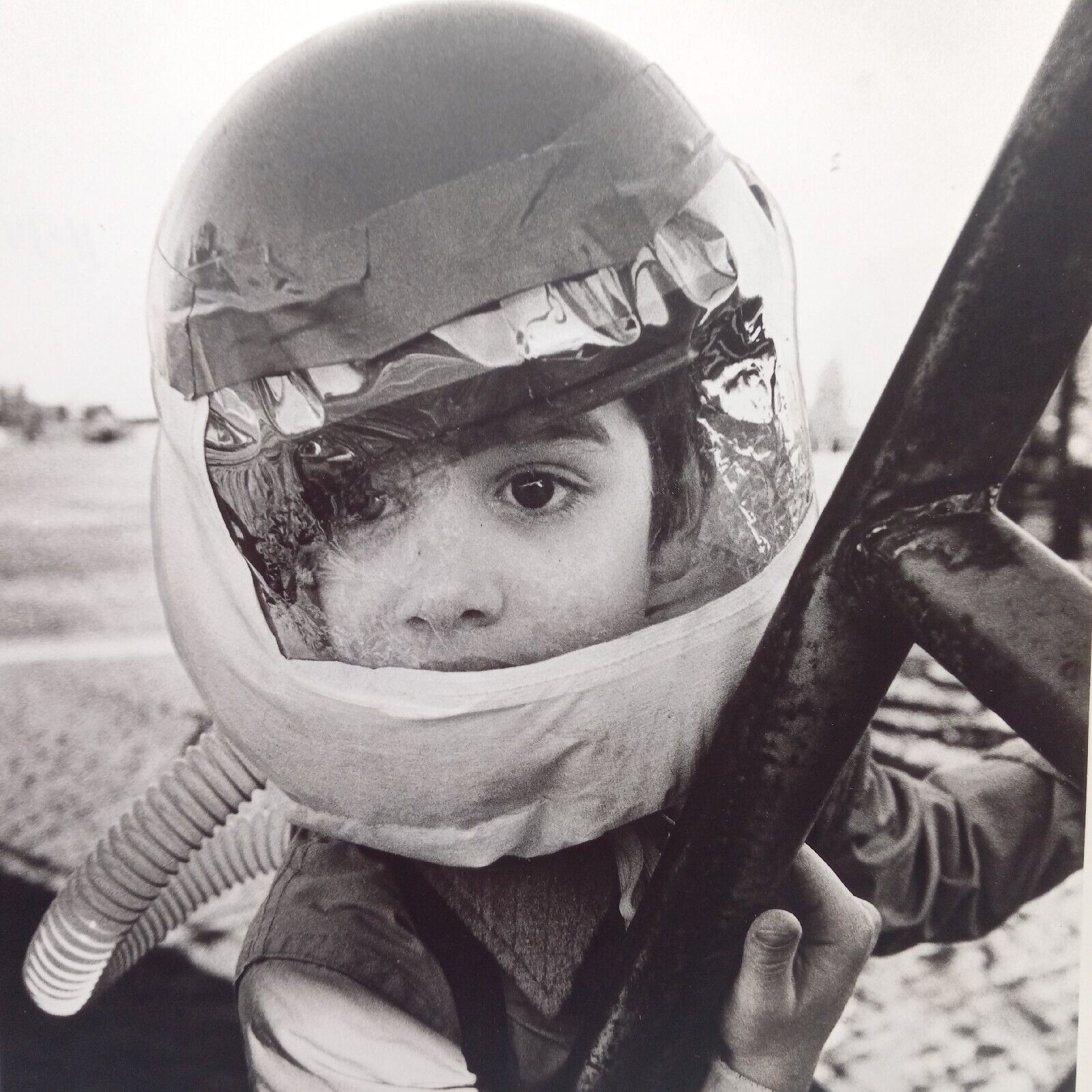 Vintage Press Photo Adorable Boy Odd Helmet Suit Costume Strange Art Snapshot