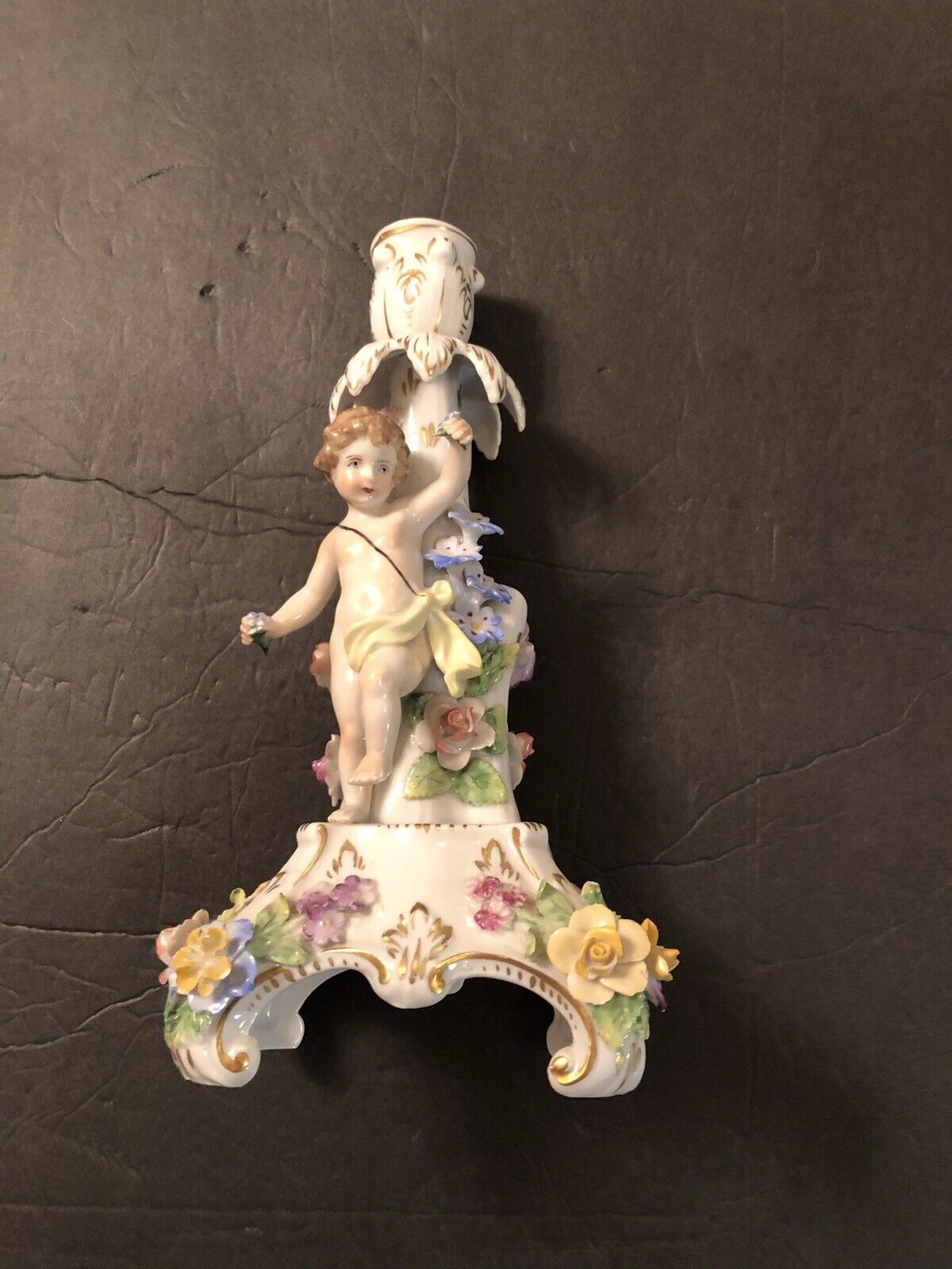 ANTIQUE DRESDEN PORCELAIN  FOOTED CANDLESTICK WITH ANGEL CHERUB