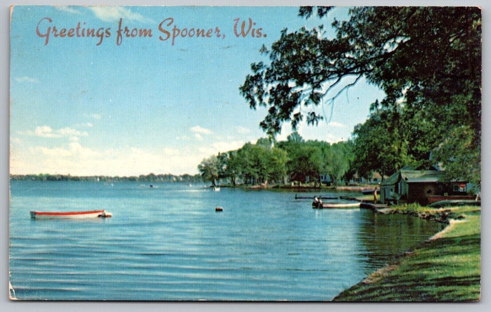 Greetings From Spooner Wisconsin WI Lake Shore Scene Rice Lake Postcard PM WOB