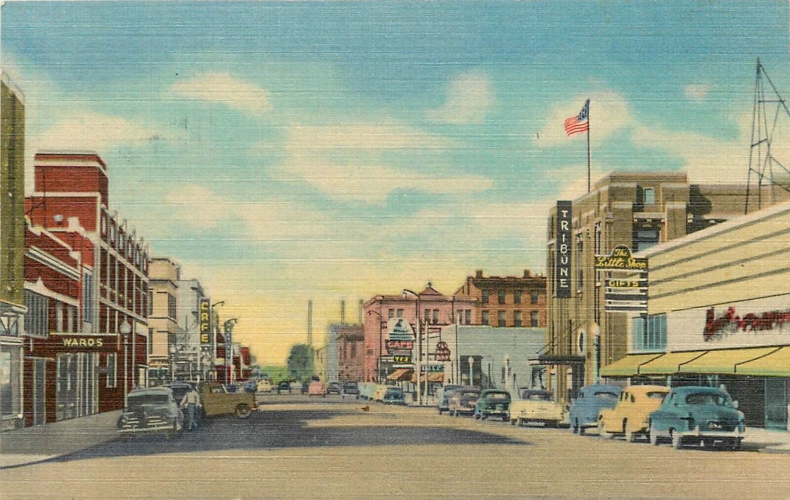 Postcard 1940s Wyoming Cheyenne Seventeenth Street Business autos WY24-1058