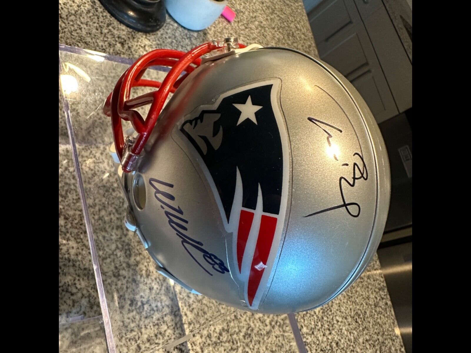 Signed Tom Brady/Wes Welker mini helmet. In perfect condition