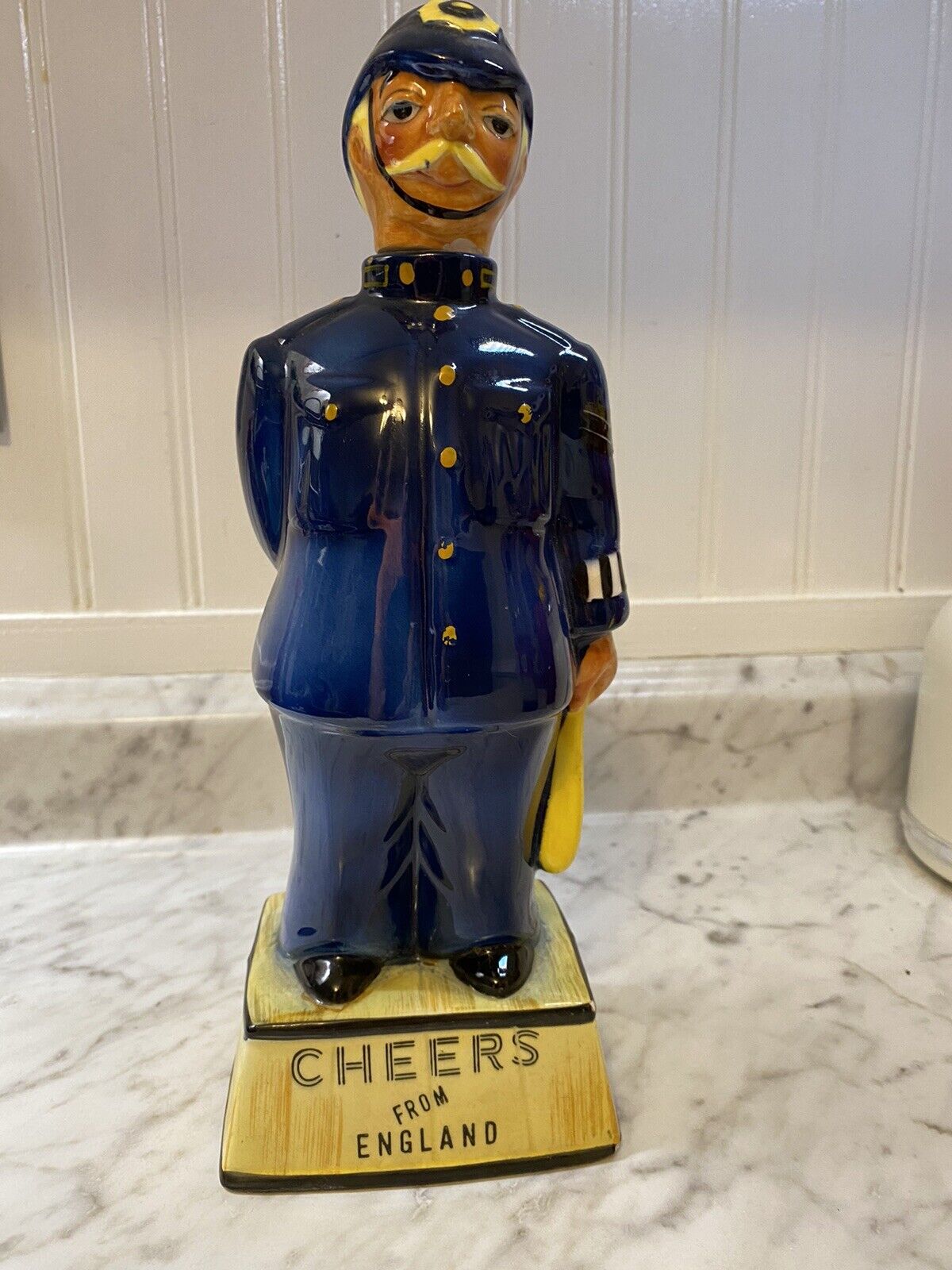 Vintage liquor bottle cheers from England ceramic police officer 
