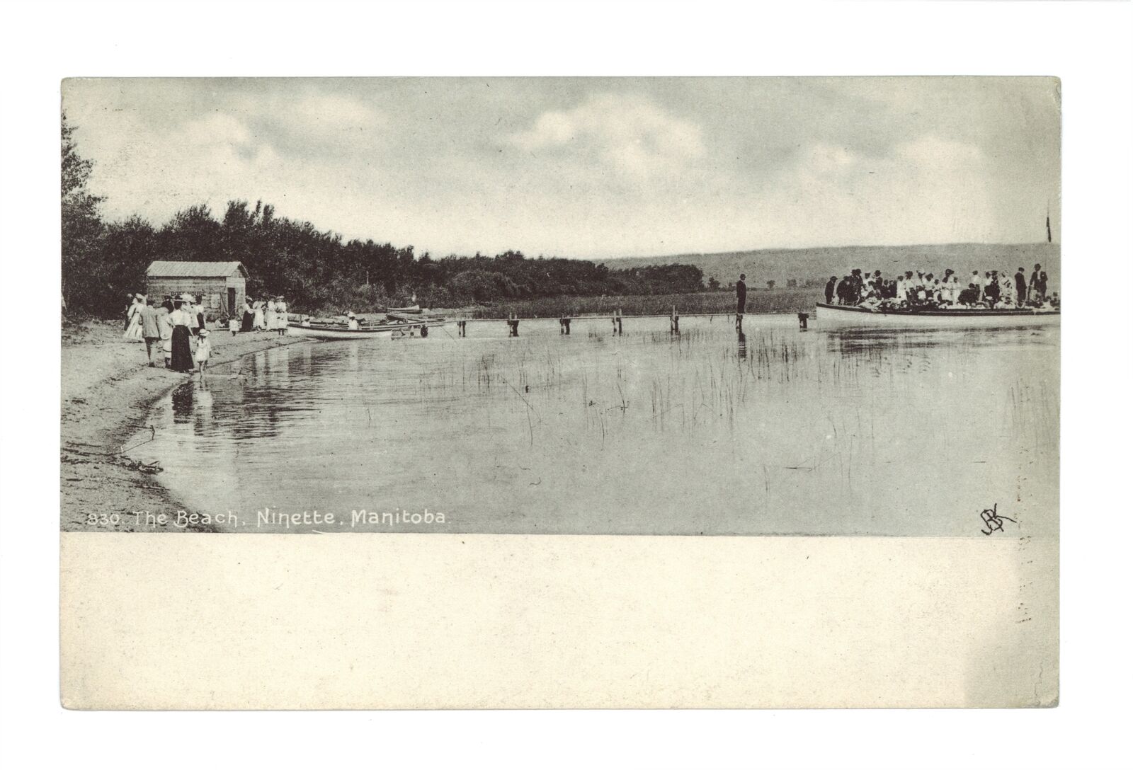 The beach Ninette Manitoba - Image shows a crowd of people loading- Old Photo