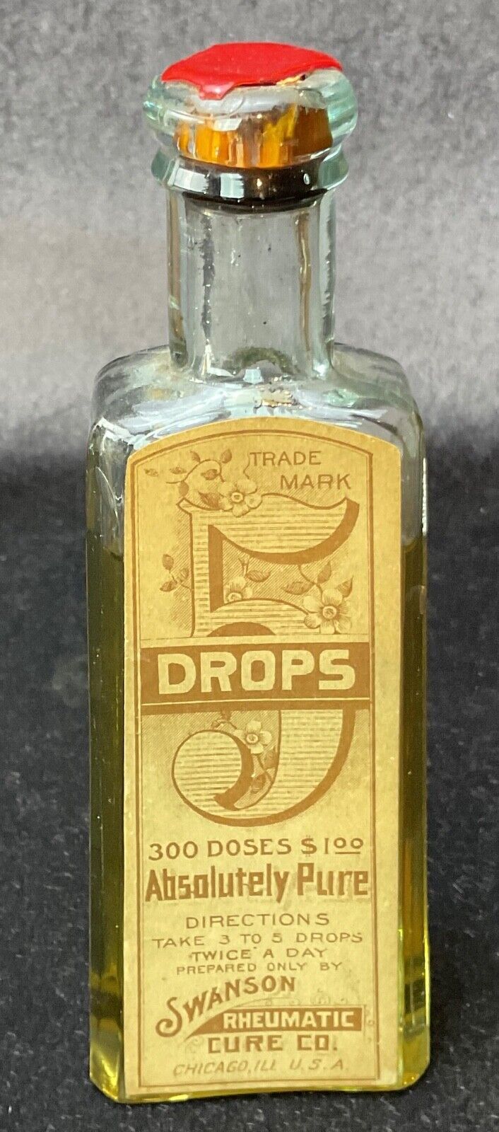 Antique Bottle Swanson Rheumatic Cure 5 Drops Sealed w Label
