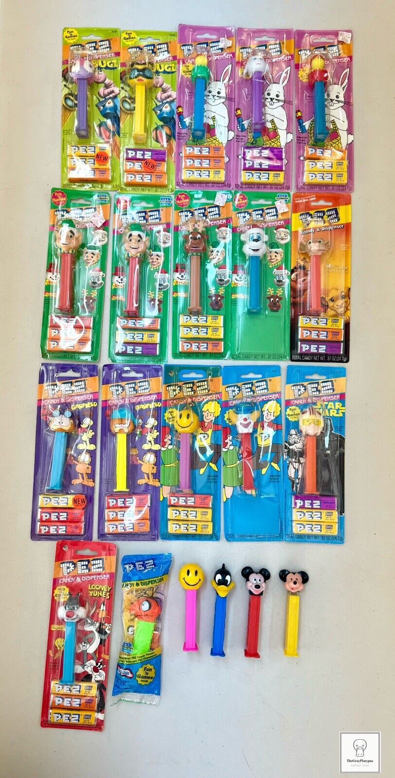 Lot of 21 Carded and Loose PEZ Dispensers from 90s/2000s Star Wars Bugs Mickey