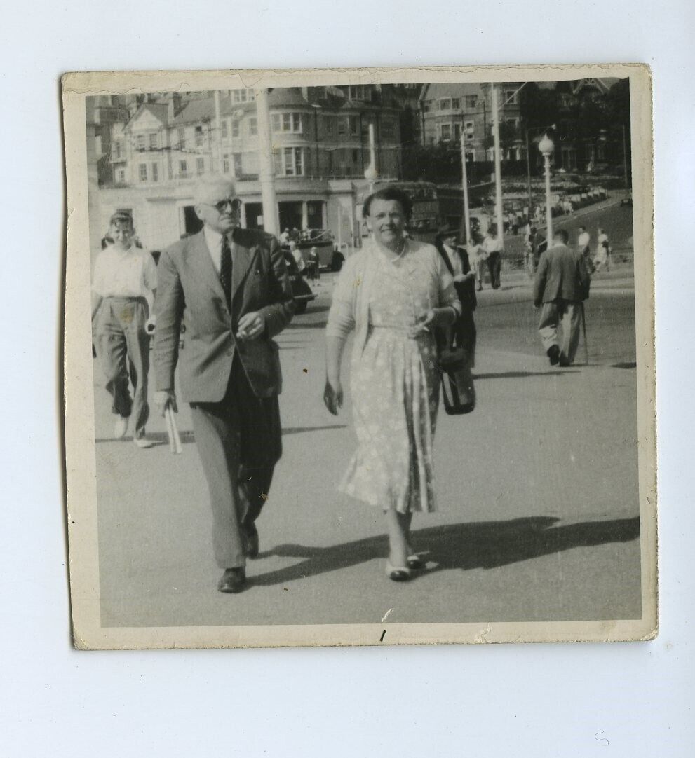 Old Couple Strolling In Street - c1950s Snapshot Photo 